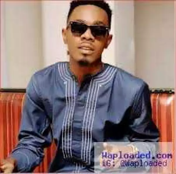Photo: Patoranking Receives New Gold Microphone From Tonto Dikeh
